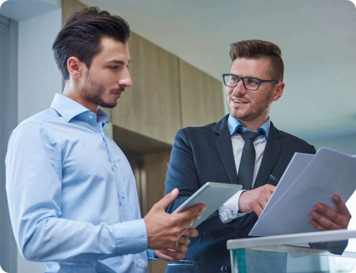 Consultants reviewing ecommerce technology plans